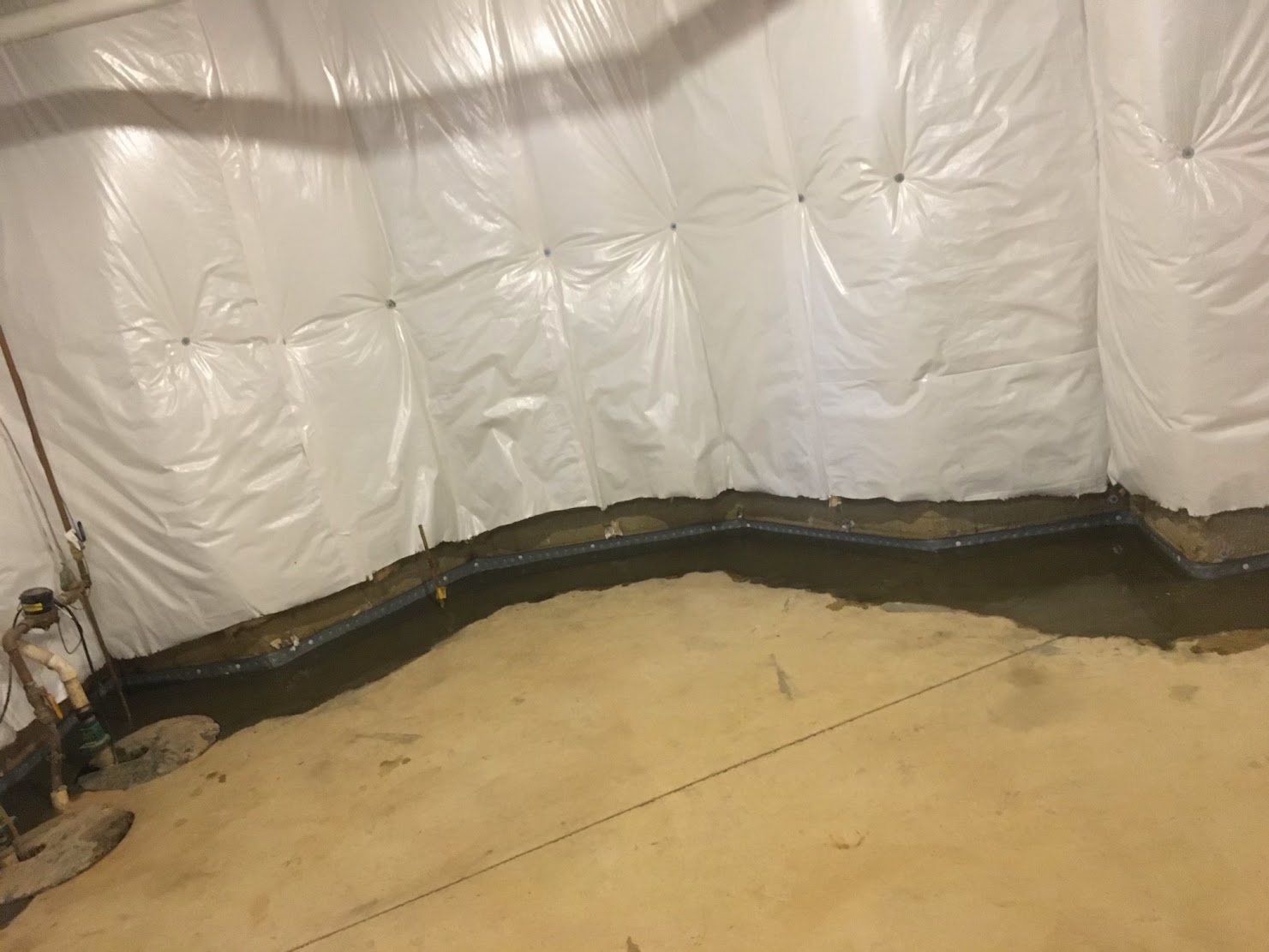 Perma Dry Michigan interior perimeter drain tile with wall vapor barrier
